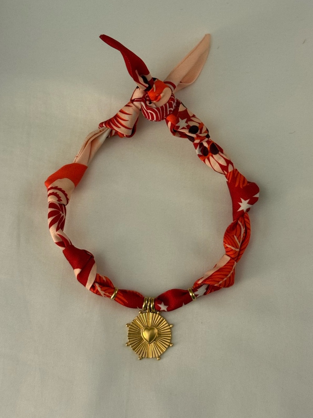 Red Patterned Silk-Twist Necklace with Gold Heart Medallion